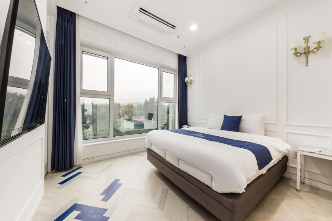 Gladsheim Hotel Seogwipo-stad Buitenkant foto